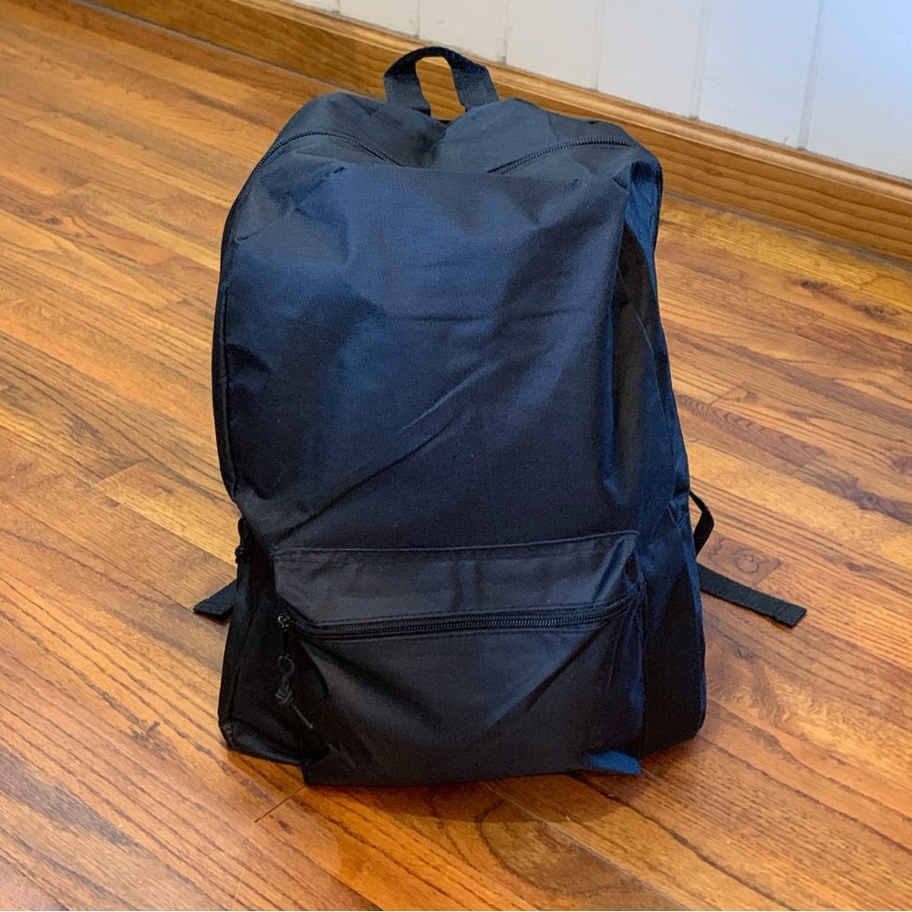 Black Canvas Backpack 18” NWOT
Zipper Pocket for Small Items 
Cushioned Straps